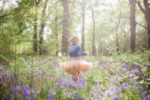 Spinning girl in the Bluebell wood