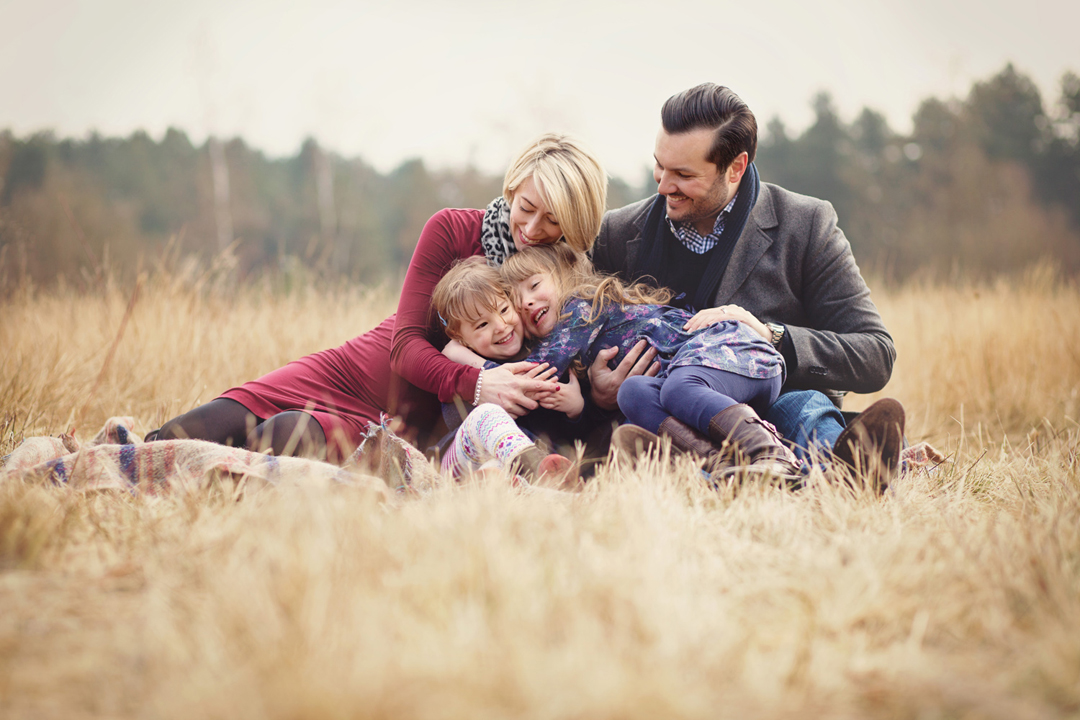 Family playing as seen on Moira Lizzie Photography client referral webpage