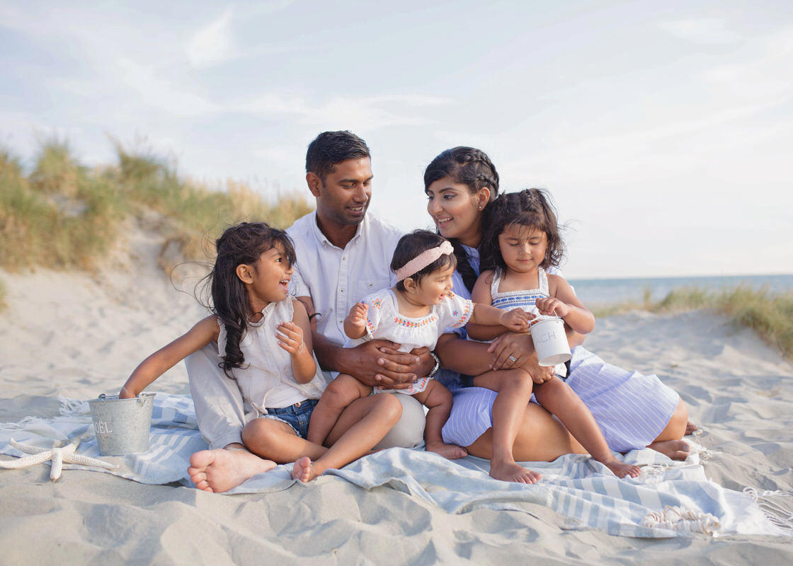 Voucher image of family on beach